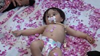 لبخند گل های محمدی به نوزادان ایرانی